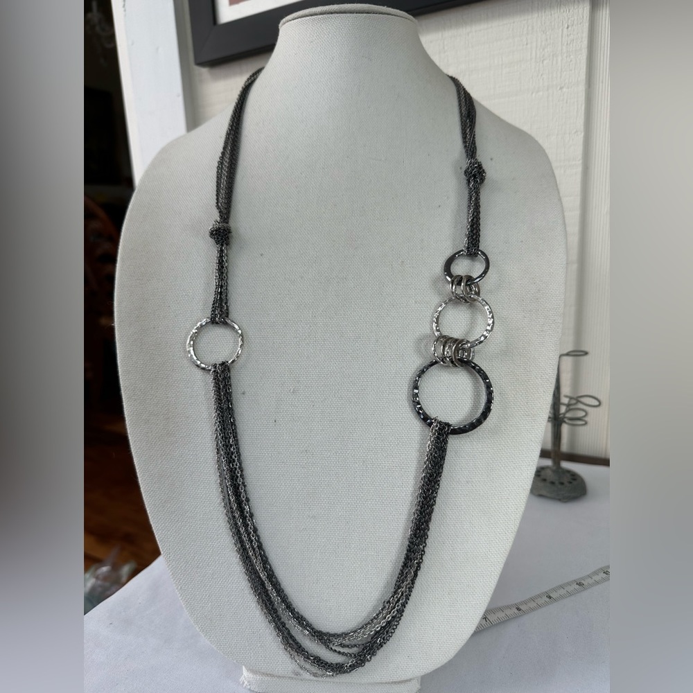 Long multi chain and hammered circles necklace